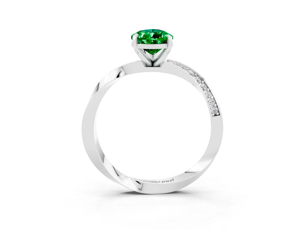 White gold Pear Cut Emerald Engagement Ring with Side Stone Accents and Four-Prong Setting