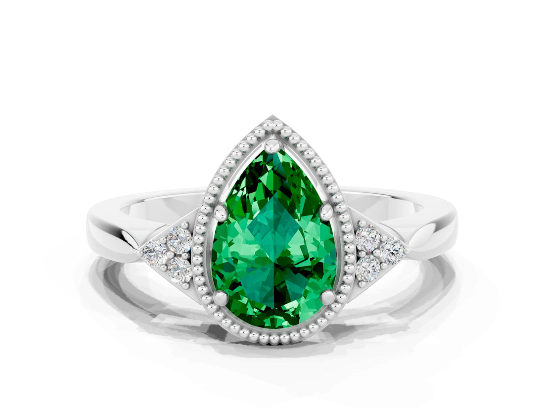 White gold Pear Cut Emerald Halo Ring with Tapered Band and Four-Prong Setting