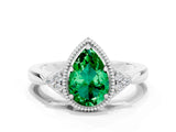 White gold Pear Cut Emerald Halo Ring with Tapered Band and Four-Prong Setting