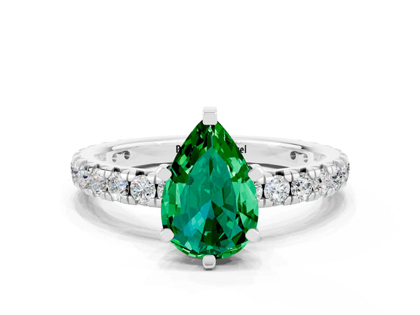 Platinum Pear Cut Emerald Pavé Solitaire Ring with Round Band and Prong Setting