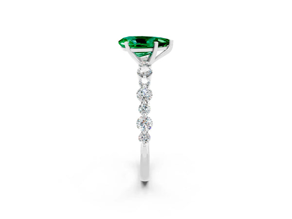 Silver Pear Cut Emerald Prong Set Engagement Ring with Pavé Band