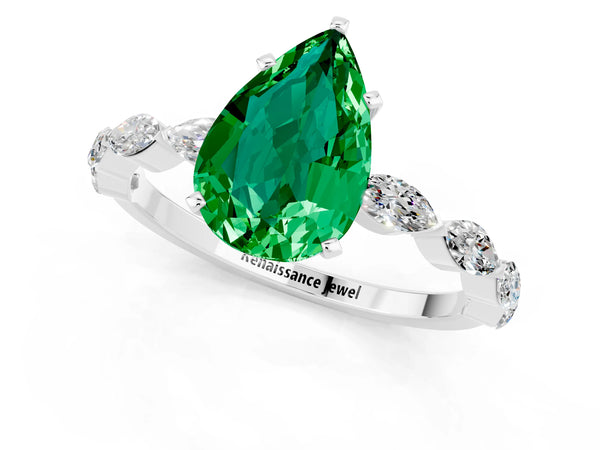 Silver Pear Cut Emerald Ring with Marquise Side Stones and Prong Setting