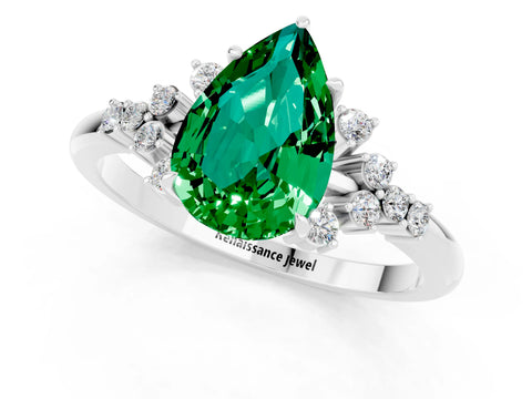 White gold Pear Cut Emerald Ring with Side Stones and Four-Prong Setting_37