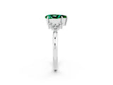 White gold Pear Cut Emerald Ring with Side Stones and Four-Prong Setting_38