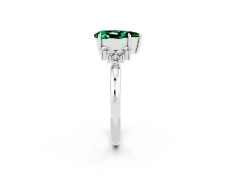 White gold Pear Cut Emerald Ring with Side Stones and Four-Prong Setting_38