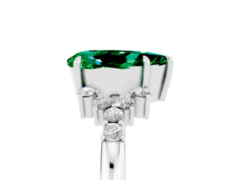 White gold Pear Cut Emerald Ring with Side Stones and Four-Prong Setting_41