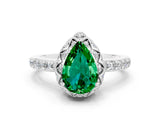 White gold Pear Cut Emerald Scalloped Halo Engagement Ring with Round Shared Prong Band_24
