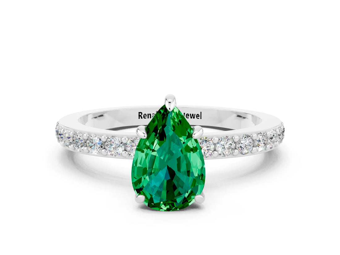 White gold Pear Cut Emerald Solitaire Engagement Ring with Pavé Band and Four-Prong Setting