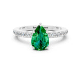 White gold Pear Cut Emerald Solitaire Engagement Ring with Pavé Band and Four-Prong Setting