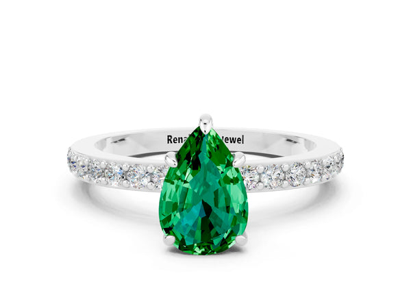 Silver Pear Cut Emerald Solitaire Engagement Ring with Pavé Band and Four-Prong Setting