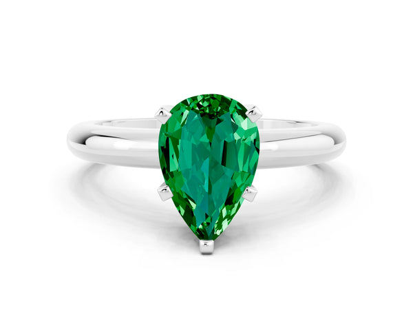Platinum Pear Cut Emerald Solitaire Engagement Ring with Round Band and Four-Prong Setting