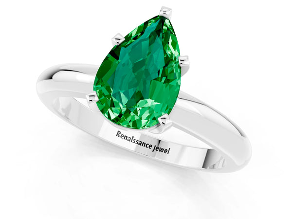 Silver Pear Cut Emerald Solitaire Engagement Ring with Round Band and Four-Prong Setting