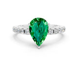 White gold Pear Cut Emerald Solitaire Pavé Band with Four-Prong Setting