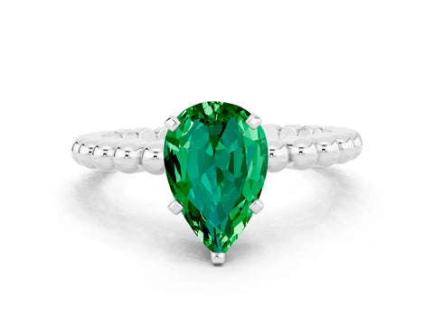 White gold Pear Cut Emerald Solitaire Ring with Beaded Band and Prong Setting