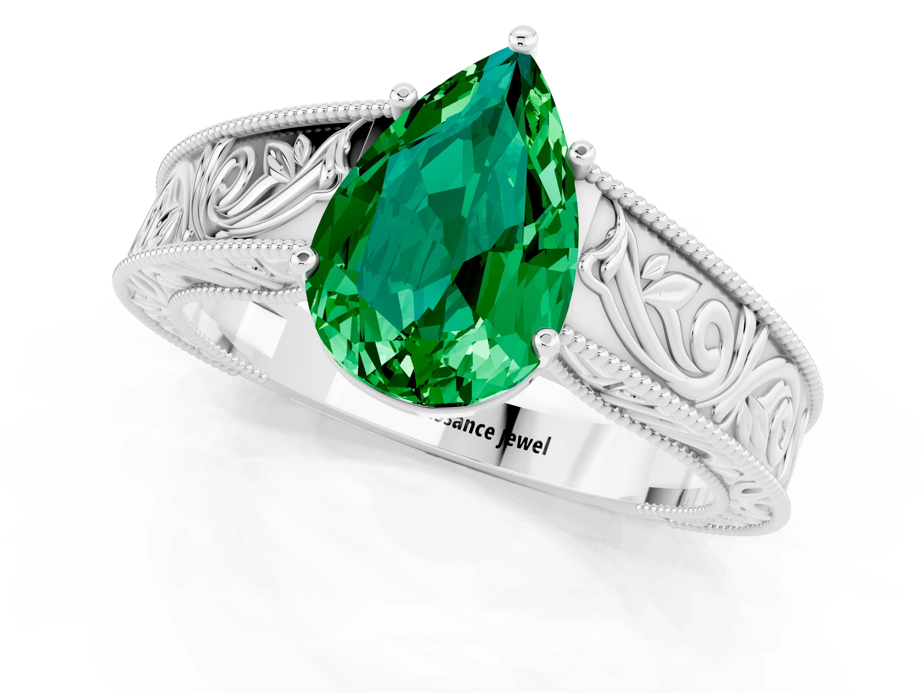 White gold Pear Cut Emerald Solitaire Ring with Engraved Band and Four-Prong Setting_1