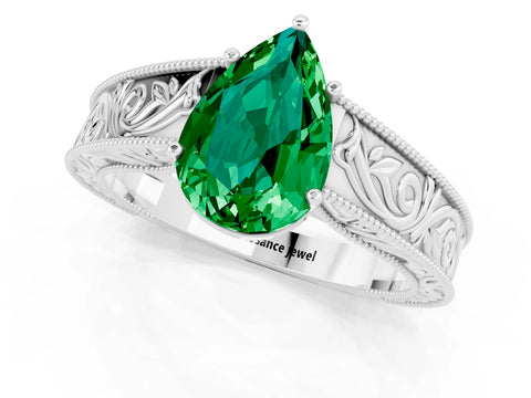White gold Pear Cut Emerald Solitaire Ring with Engraved Band and Four-Prong Setting_1