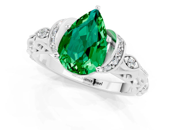 White gold Pear Cut Emerald Solitaire Ring with Filigree Band and Four-Prong Setting