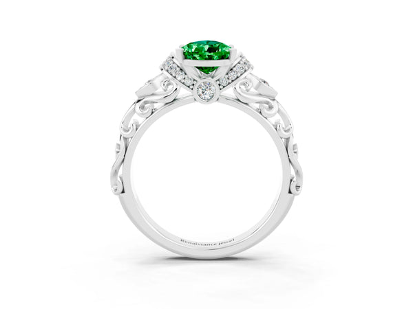 Silver Pear Cut Emerald Solitaire Ring with Filigree Band and Four-Prong Setting