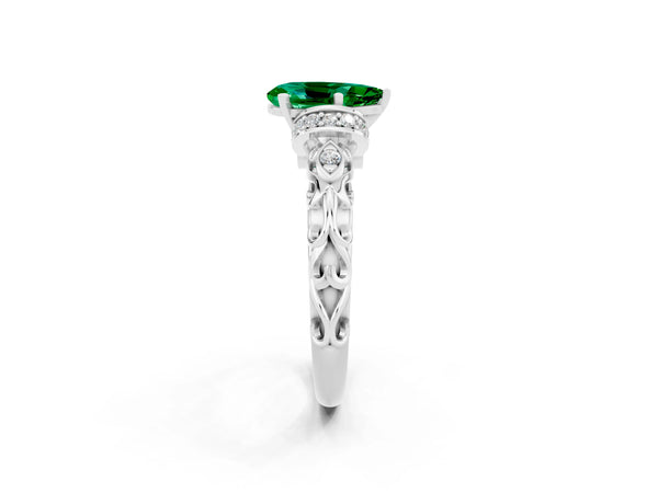 Platinum Pear Cut Emerald Solitaire Ring with Filigree Band and Four-Prong Setting