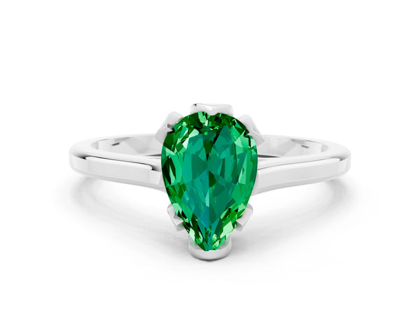White gold Pear Cut Emerald Solitaire Ring with Flower Prong Setting and Classic Band
