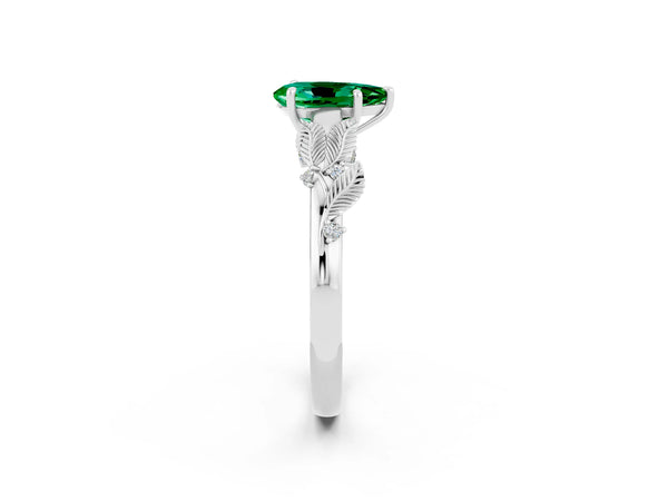 White gold Pear Cut Emerald Solitaire Ring with Leaf Motif Band and Four-Prong Setting