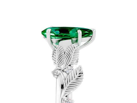White gold Pear Cut Emerald Solitaire Ring with Leaf Motif Band and Four-Prong Setting_17