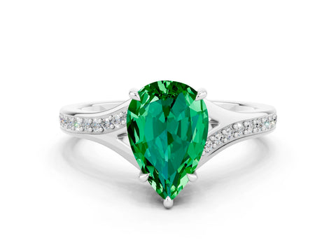 White gold Pear Cut Emerald Solitaire Ring with Pavé Band and Prong Setting