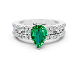White gold Pear Cut Emerald Solitaire Ring with Pavé and Channel Set Band