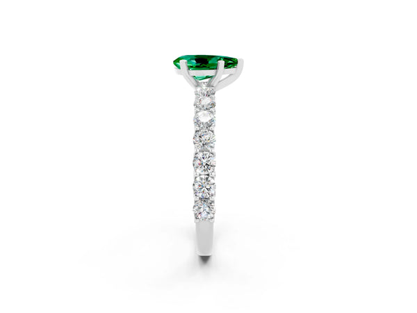 White gold Pear Cut Emerald Solitaire Ring with Shared Prong Pavé Band and Four-Prong Setting
