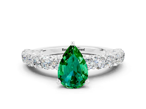 Silver Pear Cut Emerald Solitaire Ring with Shared Prong Pavé Band and Four-Prong Setting