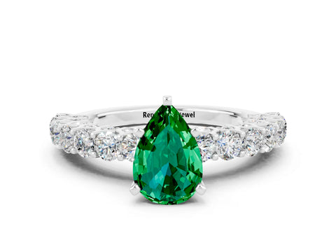 White gold Pear Cut Emerald Solitaire Ring with Shared Prong Pavé Band and Four-Prong Setting