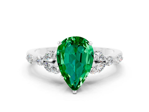 White gold Pear Cut Emerald Solitaire Ring with Side Stones and Four-Prong Setting_36