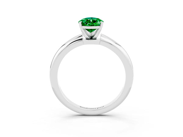 Platinum Pear Cut Emerald Solitaire Ring with Six-Prong Setting and Classic Band