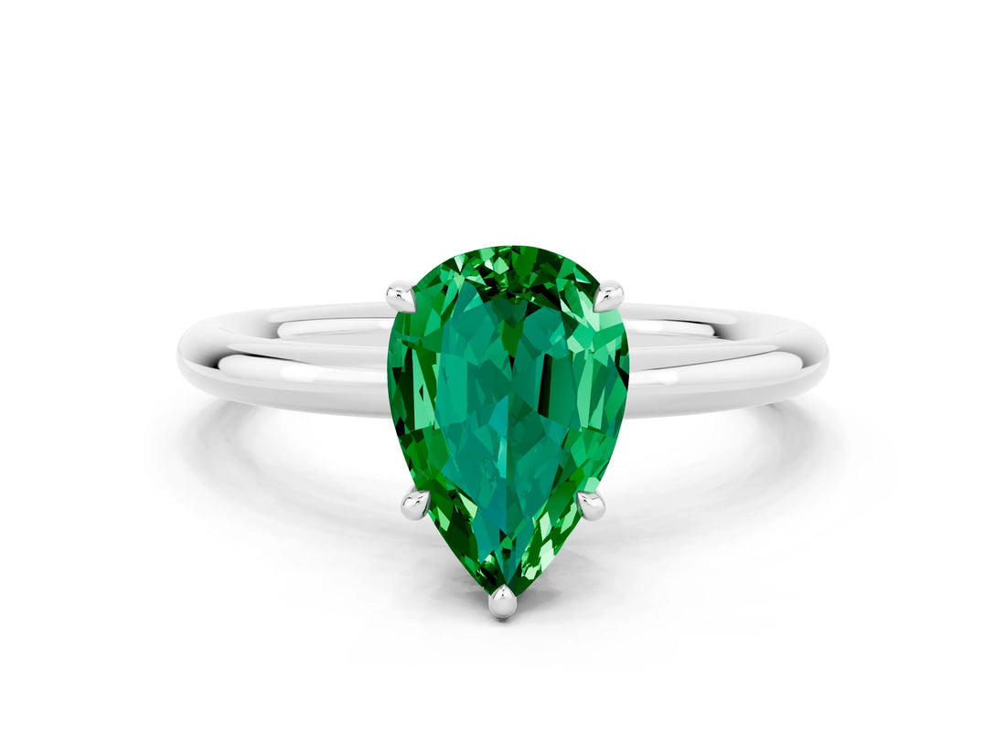 White gold Pear Cut Emerald Solitaire Ring with Thin Band and Four-Prong Setting_12