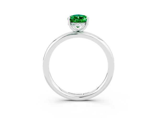 Silver Pear Cut Emerald Solitaire Ring with Thin Band and Four-Prong Setting