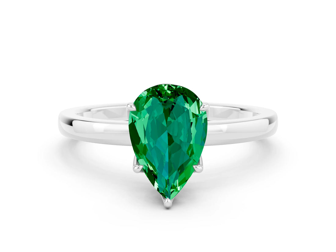 White gold Pear Cut Emerald Solitaire Ring with Thin Band and Prong Setting_12