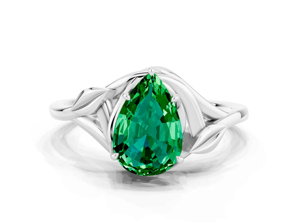 Silver Pear Cut Emerald Solitaire Ring with Twist Band and Four-Prong Setting