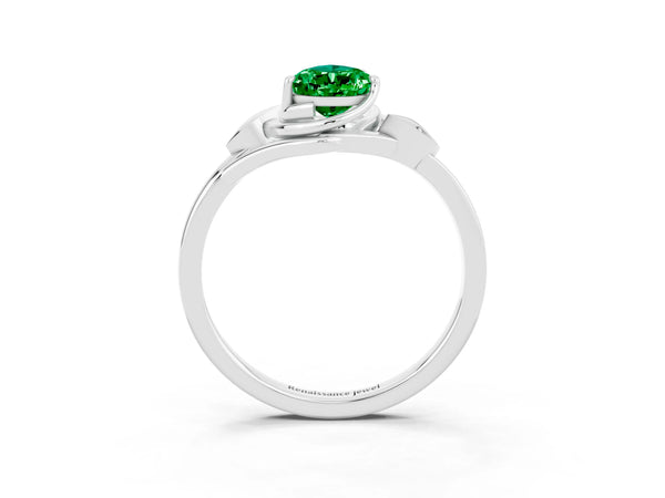 Platinum Pear Cut Emerald Solitaire Ring with Twist Band and Four-Prong Setting