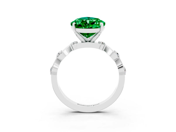 Silver Pear Cut Emerald Solitaire Twisted Band with Round  Accents and Prong Setting