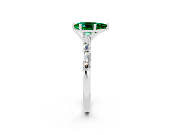 Silver Pear Cut Emerald Solitaire with Side Baguettes and Channel Set Band