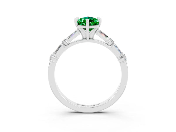 White gold Pear Cut Emerald Solitaire with Side Baguettes and Channel Set Band