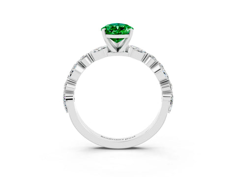 White gold Pear Cut Emerald Solitaire with Side Stones on a Pavé Band and Four-Prong Setting_3