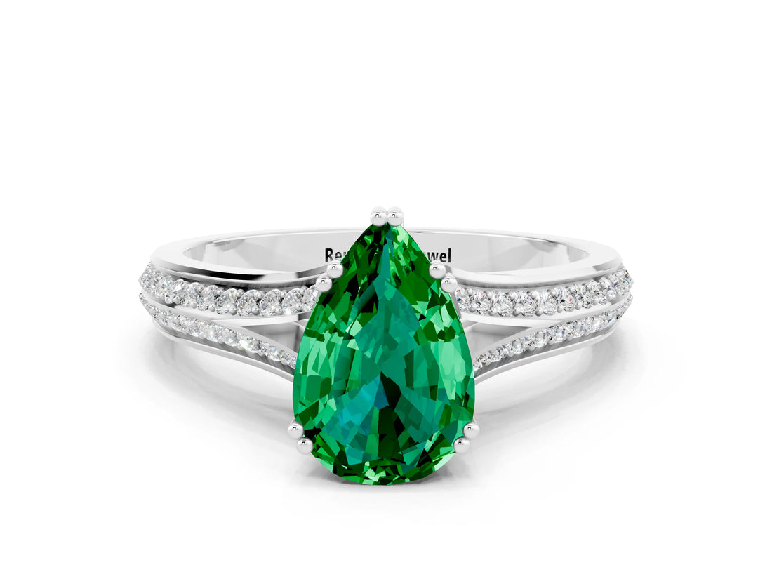 White gold Pear Cut Emerald Split Shank Engagement Ring with Pavé Band