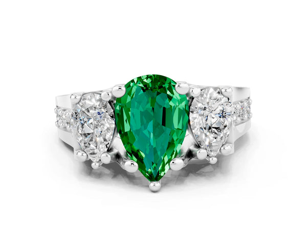 White gold Pear Cut Emerald Three-Stone Ring with Channel Set Band and Four-Prong Setting