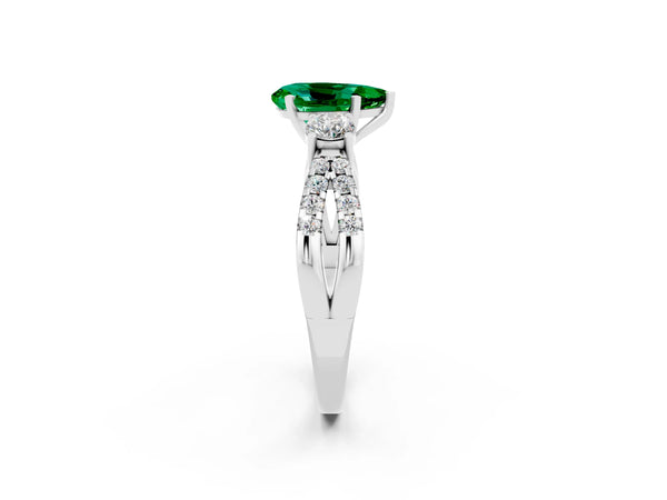 White gold Pear Cut Emerald Three-Stone Ring with Pavé Split Shank and Four-Prong Setting