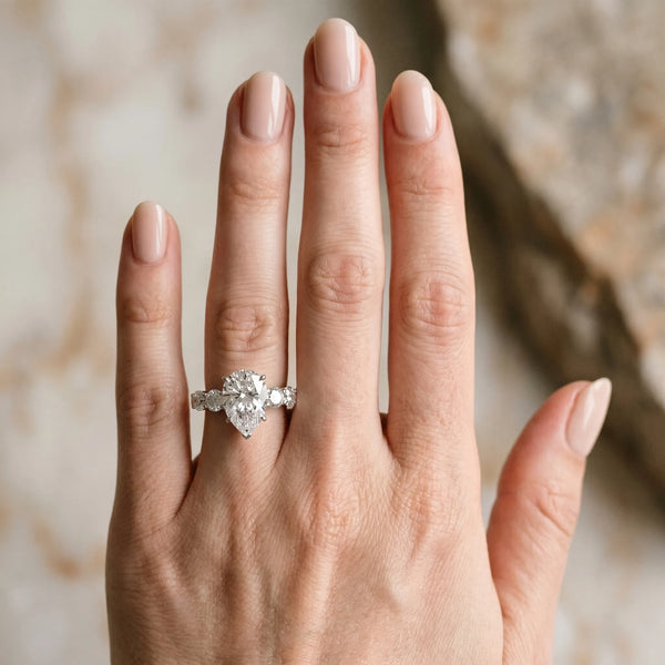 White gold Pear Cut Five-Stone Prong Set Diamond Ring with Classic Band