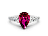 White gold Pear Cut Garnet Solitaire Ring with Cathedral Setting and Pavé Band