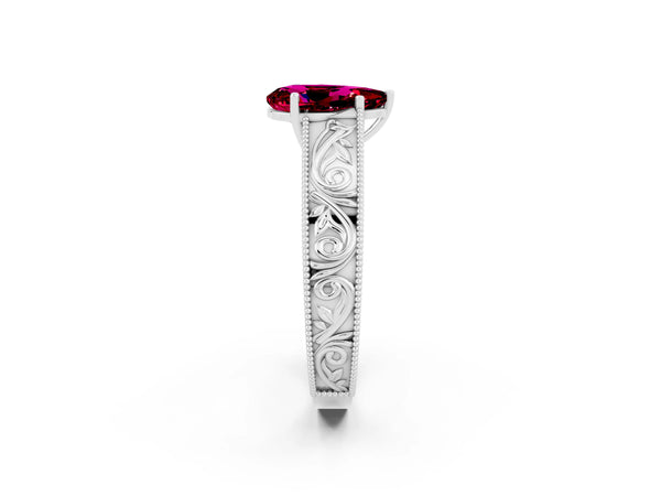 Silver Pear Cut Garnet Solitaire Ring with Engraved Band and Four-Prong Setting