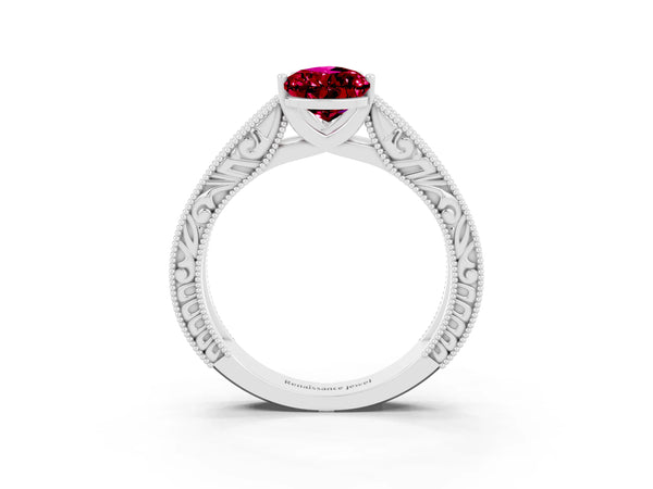 Silver Pear Cut Garnet Solitaire Ring with Engraved Band and Four-Prong Setting