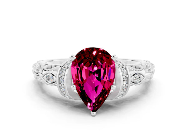White gold Pear Cut Garnet Solitaire Ring with Filigree Band and Four-Prong Setting